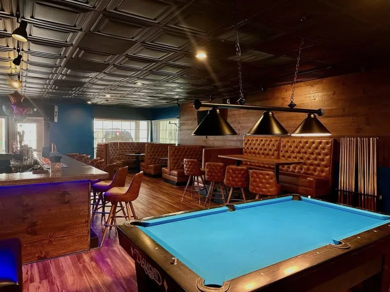 Commercial flooring installed in a billiards and bar area by The Flooring House